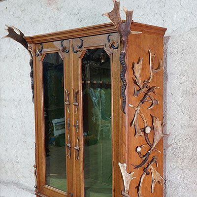 black forest antler gun cabinet ca. 1900
