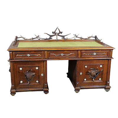 large oak wood desk with antler decorations, austria ca. 1900 large oak wood desk with antler decorations, austria ca. 1900