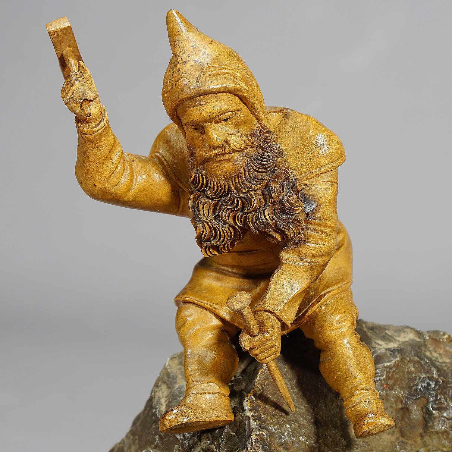 Wooden Carved Black Forest Dwarf Sitting on a Rock