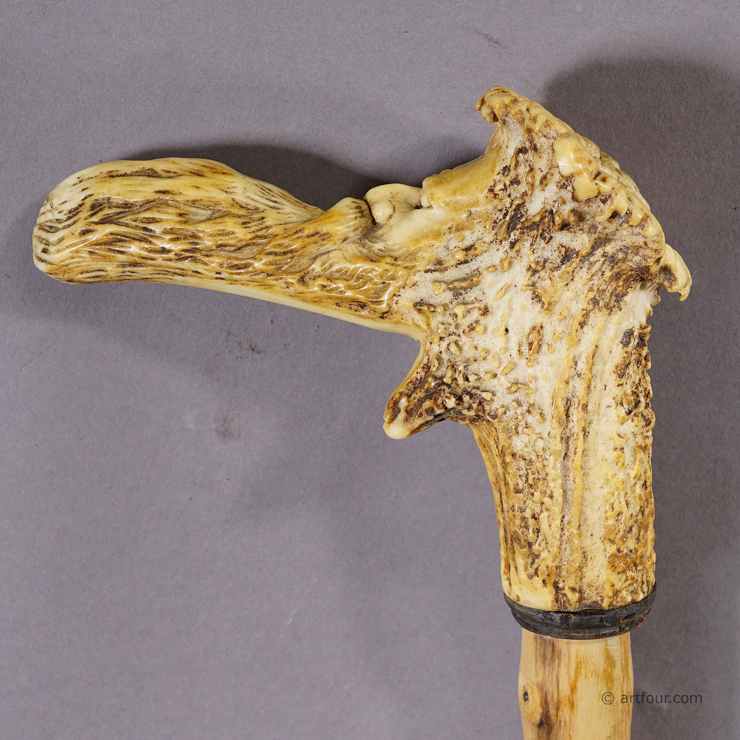 An Antique Walking Stick with Carved Deer Horn Handle