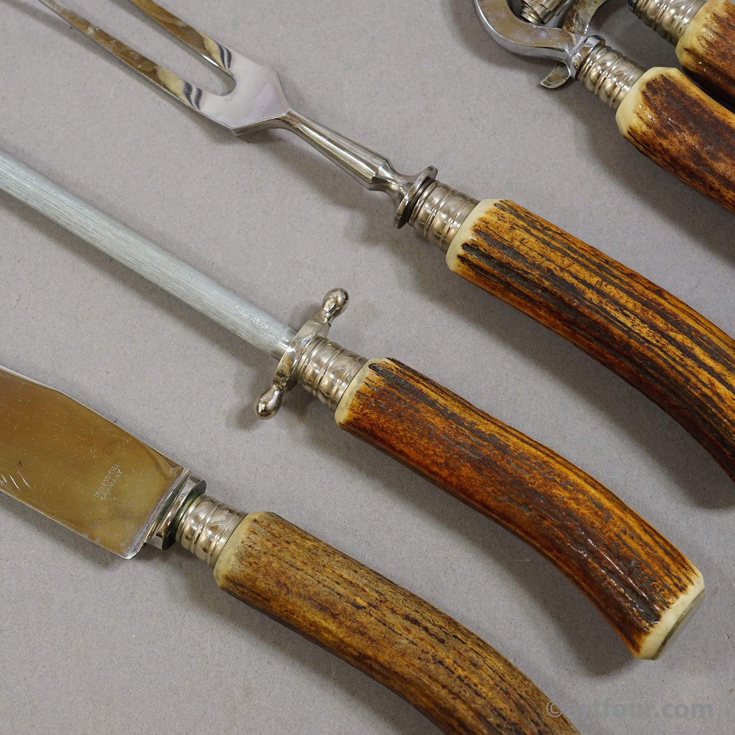 Vintage Stainless Steel and Horn 4-piece Cutlery Set Solingen, 1960s