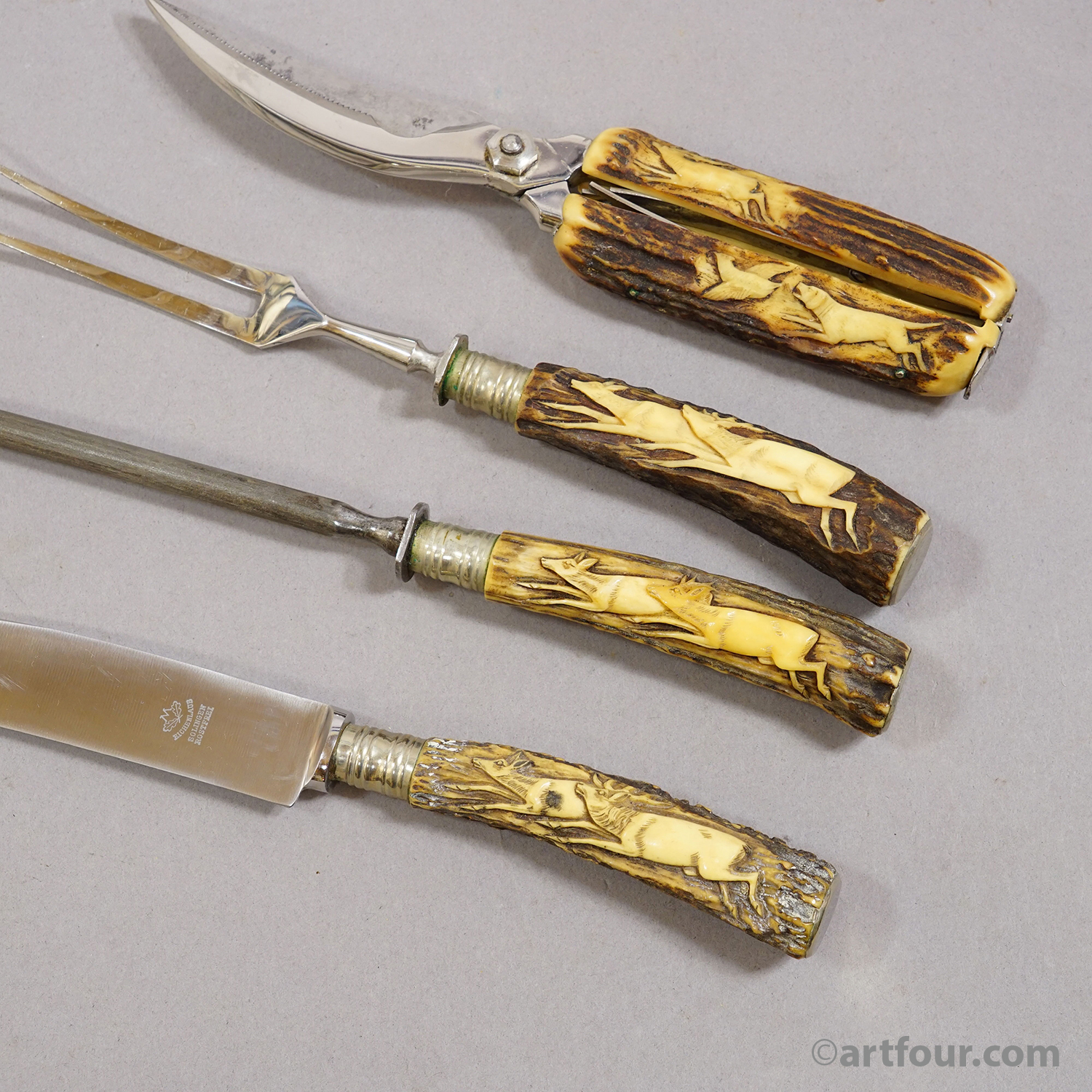 Antique Stainless Steel and Carved Horn 4-piece Cutlery Set Solingen, 1900s