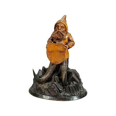 Wooden Carved Black Forest Dwarf Sitting on a Three Stump.