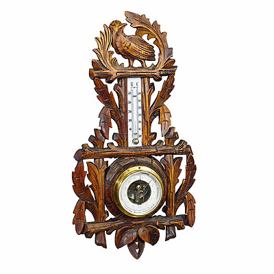A Wooden Carved Black Forest Weather Station with Bird.