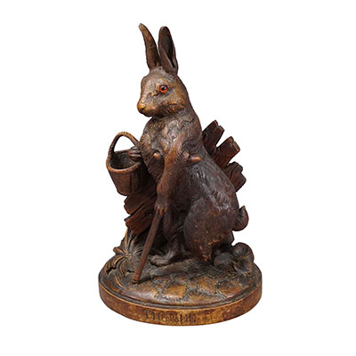 Antique Black Forest Carved Rabbit Figure with Basket, circa 1900.