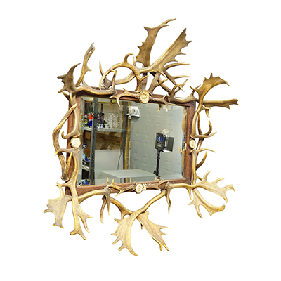 Antique Black Forest Mirror with Antler Arrangement ca. 1920s.